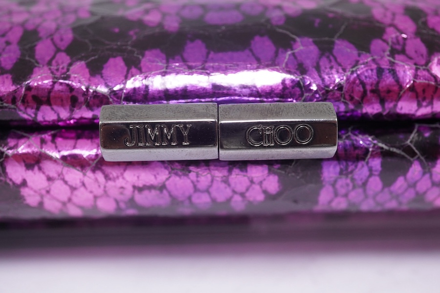 A Jimmy Choo purple and black metallic python? clutch bag